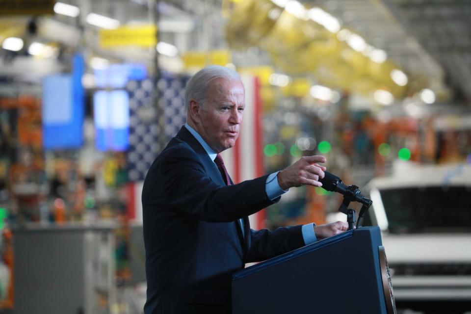 Chevrolet Bolt EV sits on display before U.S. President Joe Biden speaks at the grand opening of General Motor's Detroit-Hamtramck EV Factory Zero on Nov. 17, 2021.  The president added $7.5 billion to create new electric vehicle charging stations as part of his infrastructure package recently passed by Congress and signed into law on Monday.