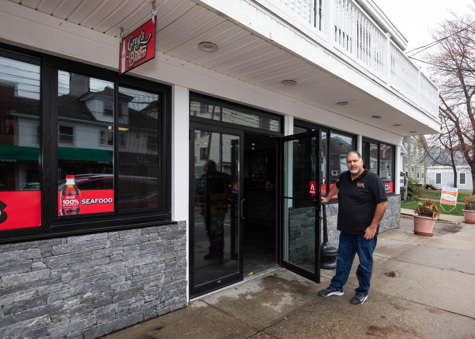 Greg's Bistro owner Hakim Said prepares for the reopening of his restaurant bar after extensive plumbing repairs were made over the past five months.