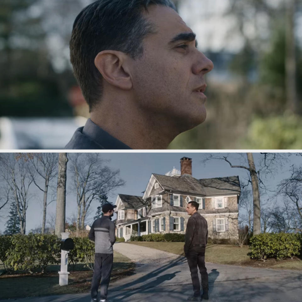 Close-up of Cannavale and standing in front of a house in "The Watcher"