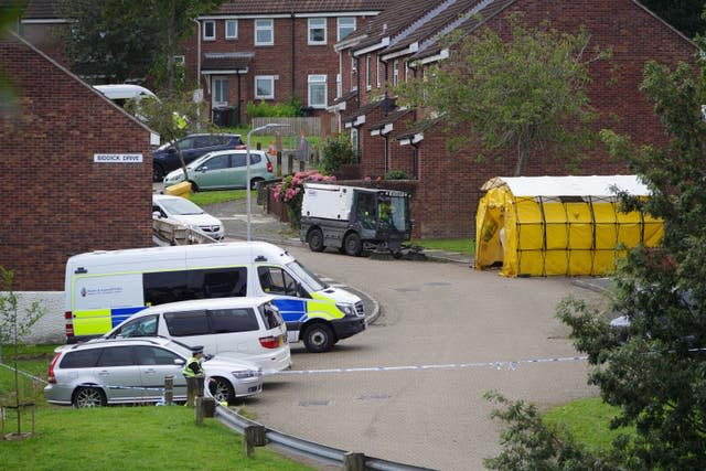 A street cleaner in Biddick Drive in the Keyham area of Plymouth, Devon, after the incident 