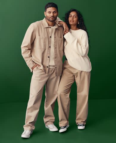 <p>Gap</p> Jay Shetty and Radhi Devlukia pose for Gap