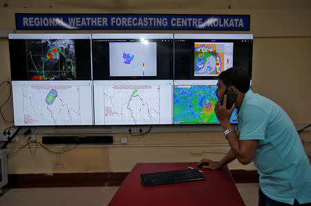 Debapriya Roy, a scientist at India Meteorological Department Earth System Science Organisation, monitors Cyclone Fani inside his office in Kolkata, India, May 3, 2019. REUTERS/Rupak De Chowdhuri