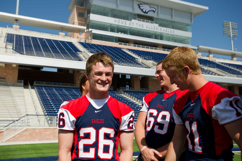Allen Eagle starting quarterback, Oliver Pierce (26), has a laugh with a few of his teammates during Media Day on Aug. 3 for the new Allen Eagle Stadium. (Michael Prengler/Special Contributor/AP Photo)