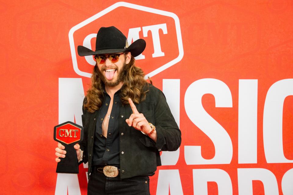 Warren Zeiders poses with his Breakthrough Male Video of the Year award during the CMT Music Awards at Moody Center in Austin, Texas on Sunday, April 7, 2024.