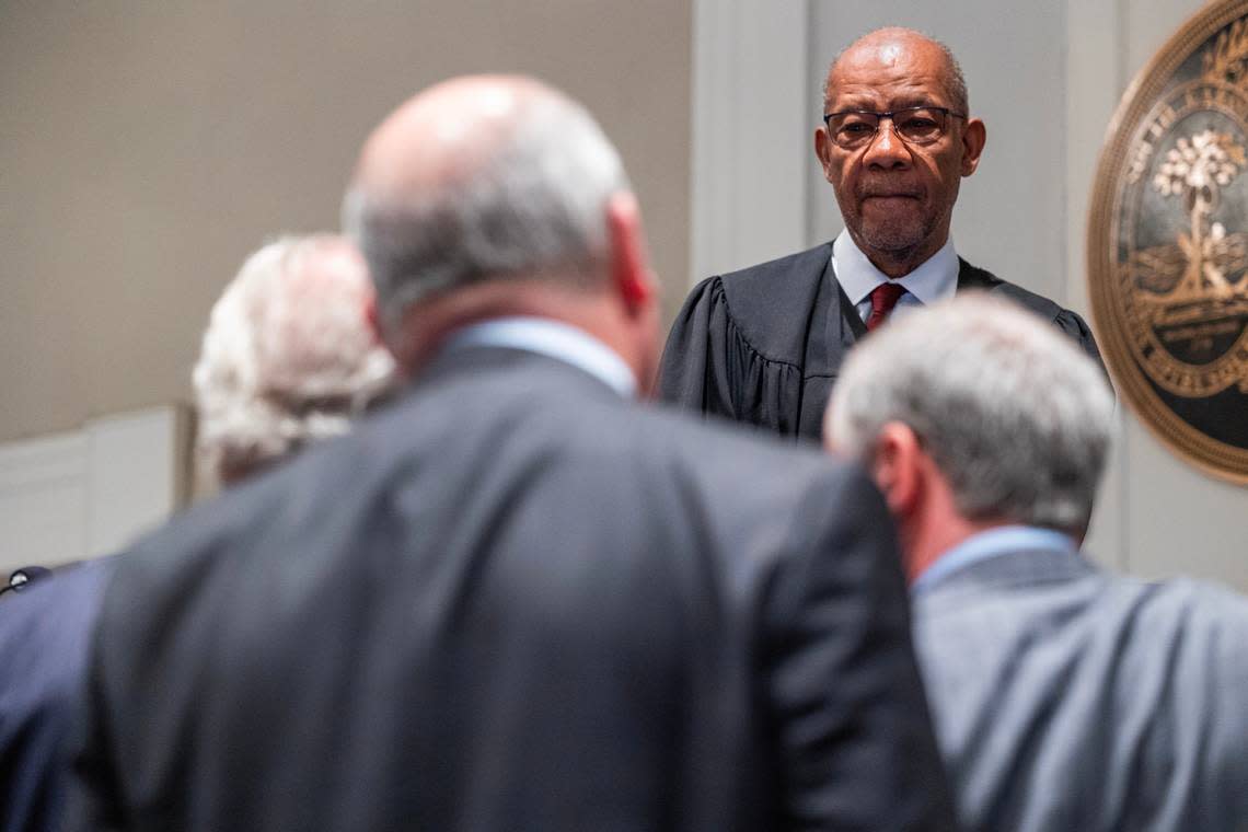 The defense and prosecution speak with Judge Clifton Newman about scheduling next week’s activities in Alex Murdaugh’s trial for murder at the Colleton County Courthouse on Friday, Feb. 24, 2023. Joshua Boucher/The State/Pool