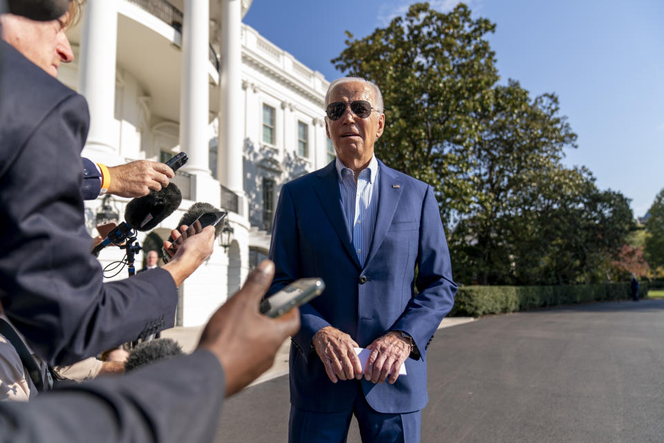 President Joe Biden takes questions from reporters before he boards Marine One on the South Lawn of the White House in Washington, Thursday, Nov. 9, 2023, for a short trip to Andrews Air Force Base, Md., and then on to Illinois. (AP Photo/Andrew Harnik)