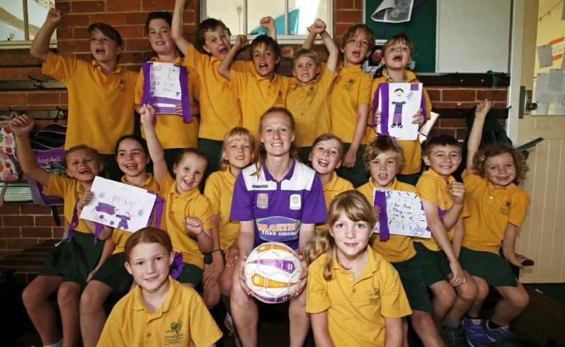 Perth Glory's women's team player and award winning school teacher Shannon May pictured with her supportive year 2 students at Kensington Primary School. Shannon will be playing in today's grand final. Picture: Lincoln Baker/The West Australian.