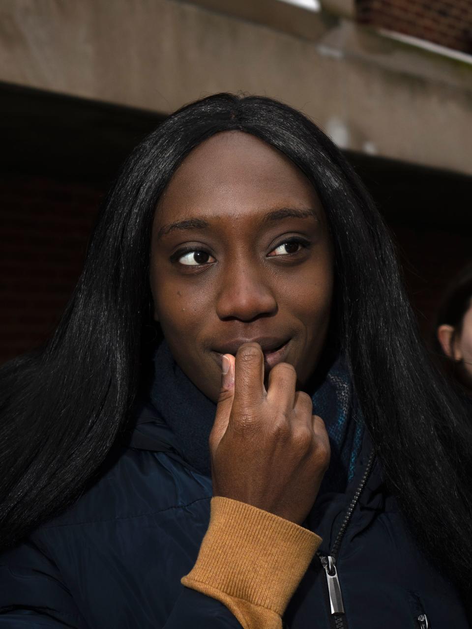 Tunshore, 18, born in Nigeria and a student at NYU: "I'm still feeling it out. We’ll see how it goes and what I decide. Gun control is really important, medical care is really important."