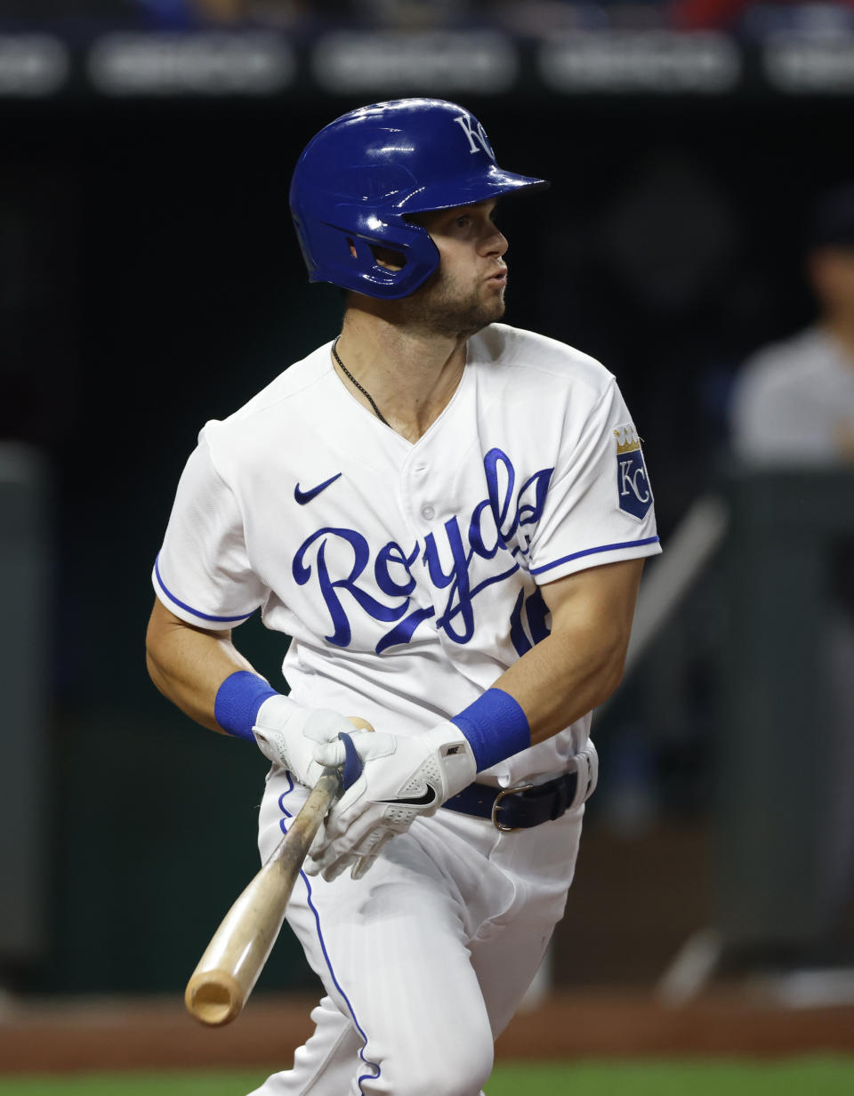 Kansas City Royals' Andrew Benintendi hits in the tying run during the eighth inning of a baseball game against the New York Yankees at Kauffman Stadium in Kansas City, Mo., Monday, Aug. 9, 2021. (AP Photo/Colin E. Braley)