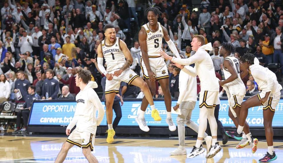 Wichita State players celebrate a 69-68 victory over Southern Illinois at Koch Arena on Saturday night.