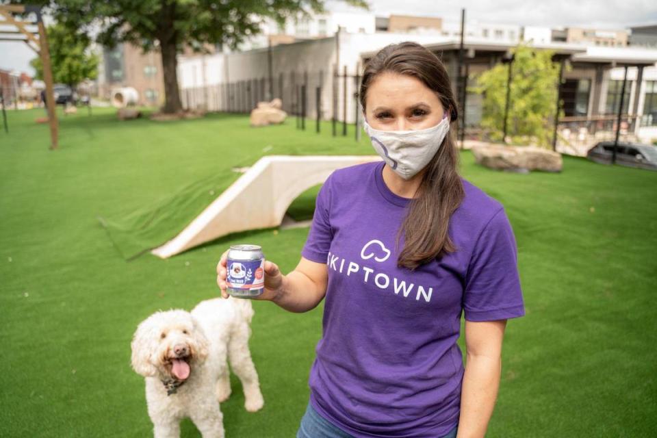 CEO of Skiptown Meggie Williams shows off her Dog Beer (don’t worry, it’s beef broth) and the outdoor area for dogs to play.