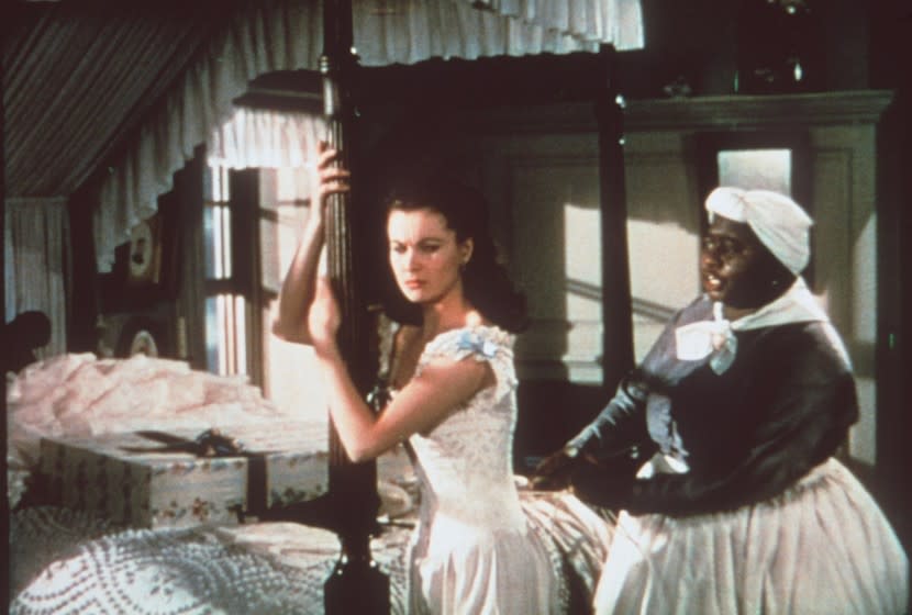 "Gone With the Wind," starring Vivien Leigh, left, as Scarlett O'Hara, and Hattie McDaniel as house servant Mammy, garnered McDaniel the first Oscar for an African American performer.