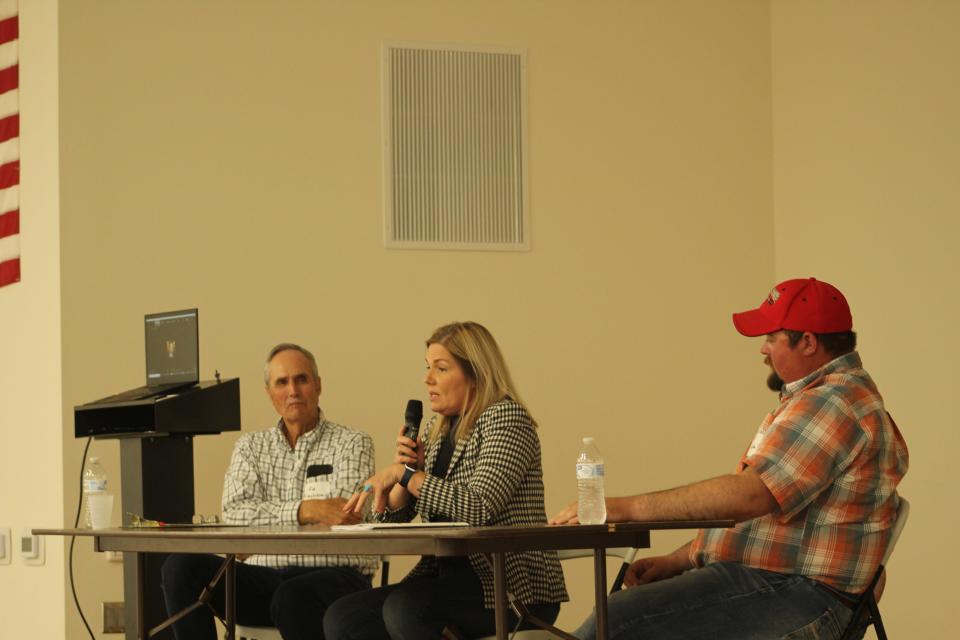 Ed Fischbach, Jane Kleeb and Mark Lapka speak at a rally in opposition to Summit Carbon Solutions' proposed carbon sequestration pipeline in Mellette on Sunday evening.