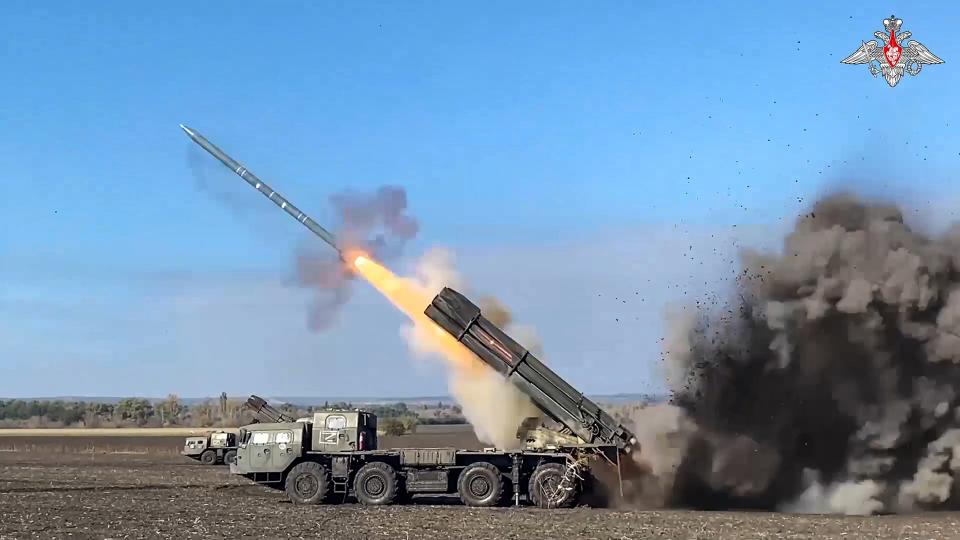 In this image taken from video released by the Russian Defense Ministry Press Service on Thursday, March 21, 2024, a Russian self-propelled 300 mm multiple rocket launcher "Smerch" fires rockets towards Ukrainian position, in an undisclosed location, in Ukraine. (Russian Defense Ministry Press Service via AP)