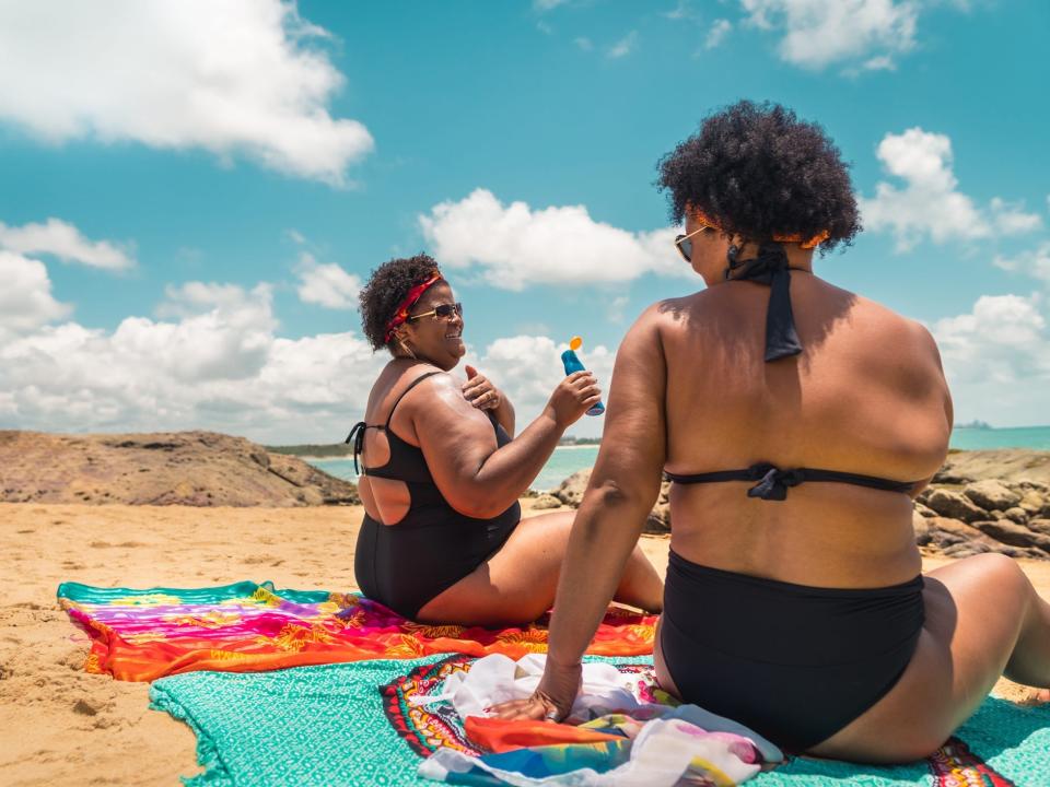 Sunscreen on back at beach