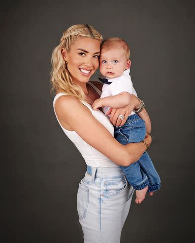 <p>Andrea Domjan Photography</p> Heather Rae El Moussa poses with son Tristan.