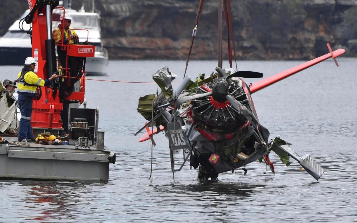 NSW police and salvage personnel recovering the crashed plane  - AAP Images