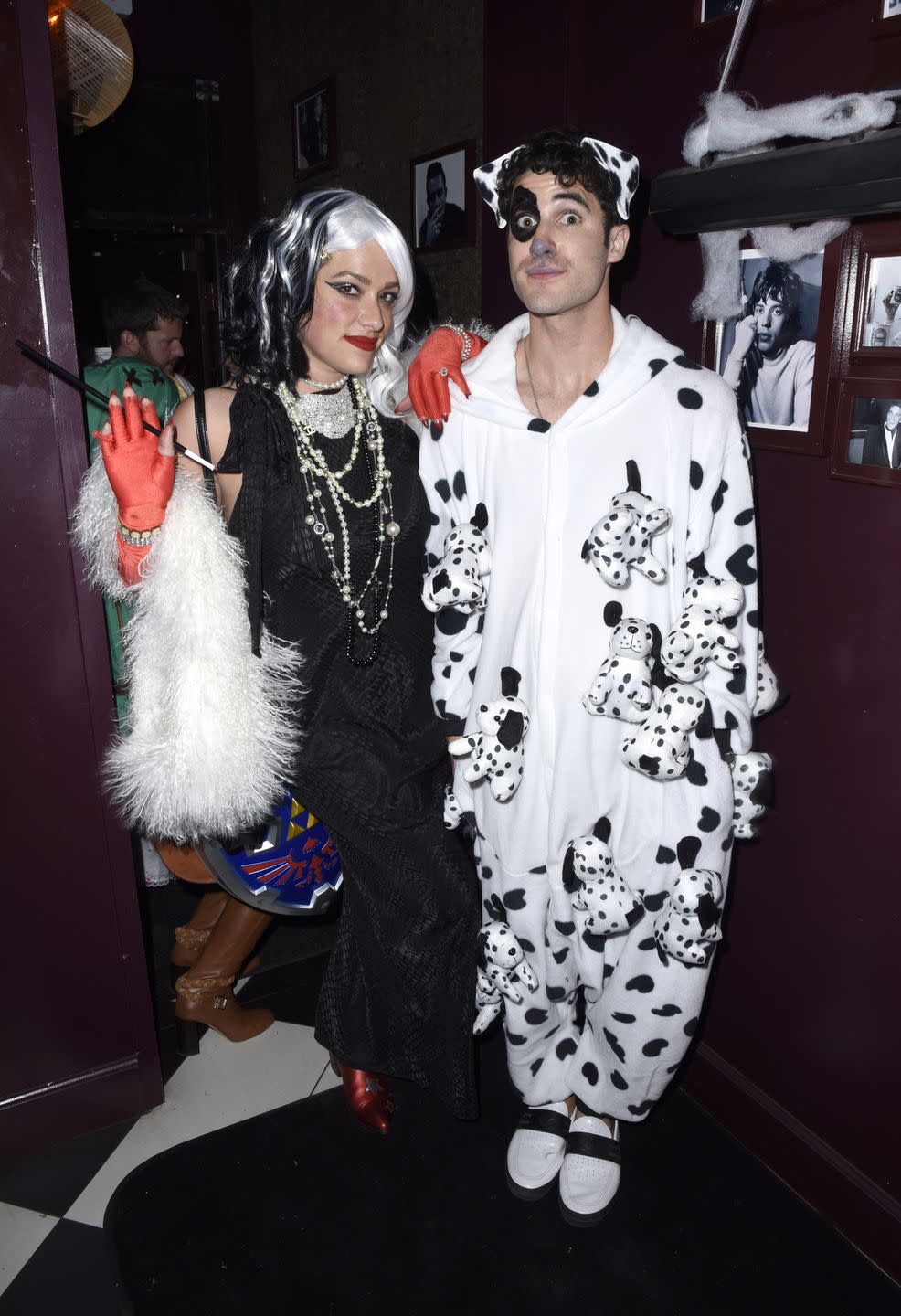 couples halloween costumes cruella de vil and a dalmation from '101 dalmatians'