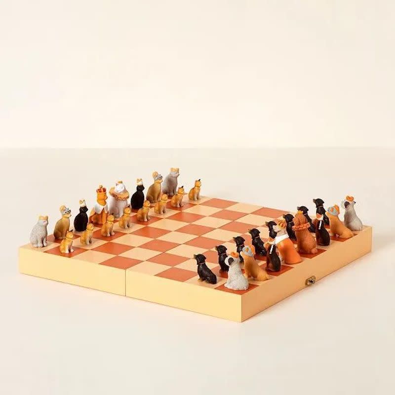 <p><a href="https://go.redirectingat.com?id=74968X1596630&url=https%3A%2F%2Fwww.uncommongoods.com%2Fproduct%2Fdogs-vs-cats-chess-set&sref=https%3A%2F%2Fwww.esquire.com%2Flifestyle%2Fg23681751%2Ffunny-christmas-gifts-ideas%2F" rel="nofollow noopener" target="_blank" data-ylk="slk:Shop Now;elm:context_link;itc:0;sec:content-canvas" class="link rapid-noclick-resp">Shop Now</a></p><p>Dogs vs. Cats Chess Set</p><p>uncommongoods.com</p><p>$179.00</p>