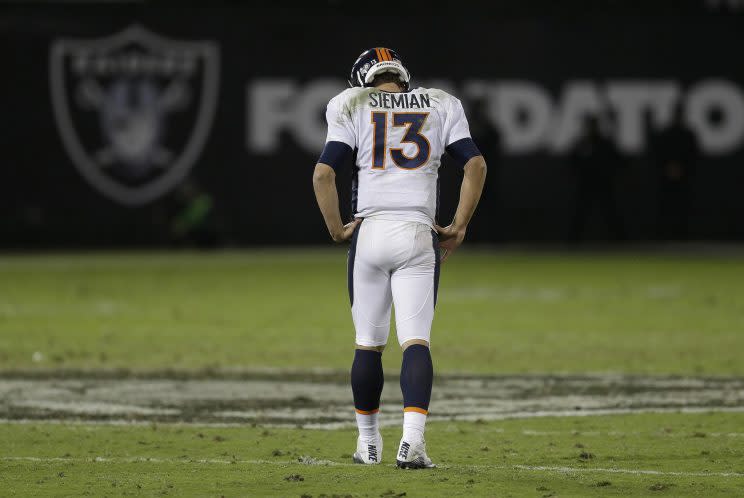 The Broncos are getting questions about whether they might bench Trevor Siemian (AP)