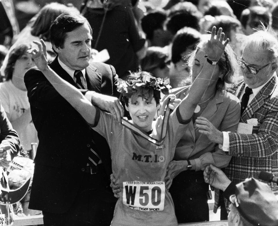 Rosie Ruiz receives a crown after being the first woman to cross the finish line during the 1980 Boston Marathon. (Getty)