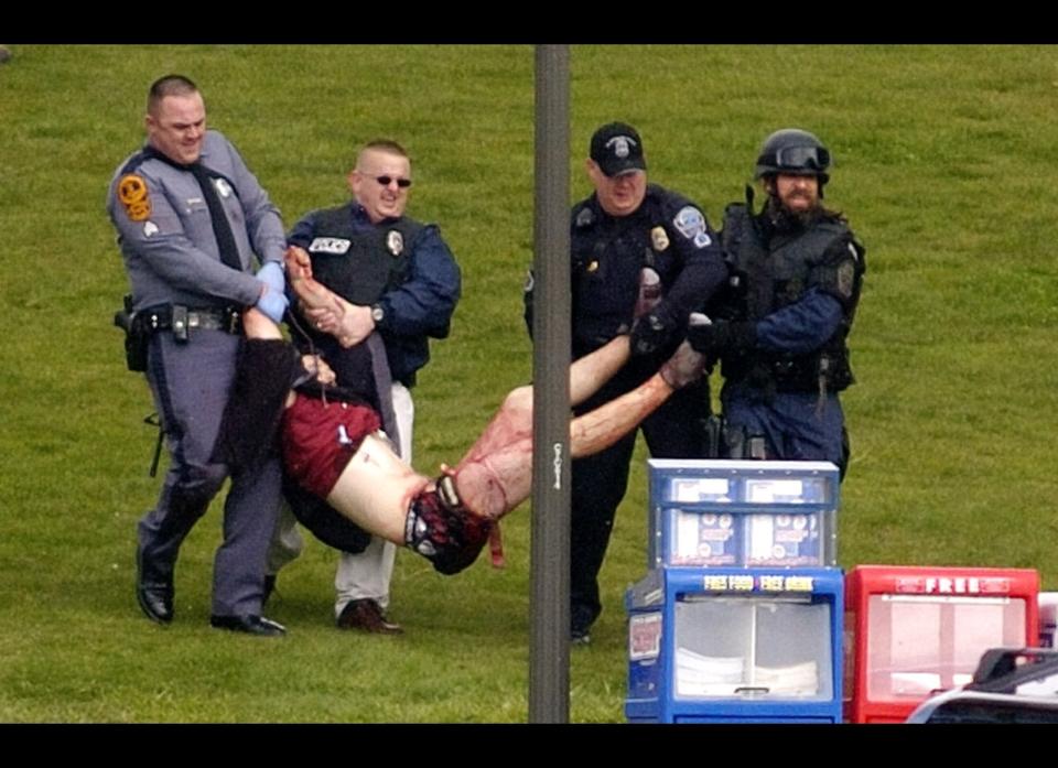 Virginia Tech, a university in Blacksburg, Virginia, becomes site of the deadliest rampage in U.S. history when a gunman kills 32 people and himself. <br>  <em>Caption: In this April 17, 2007, file photo, Virginia Tech student Kevin Sterne is carried out of Norris Hall at Virginia Tech University in Blacksburg, Va., after a gunman opened fire in a dorm and classroom on the campus. (AP photo)</em>    
