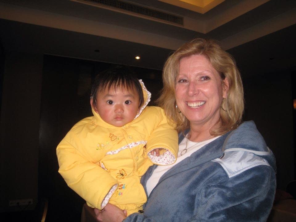 I am a single mom who adopted my daughter Lily from China in January 2010 after waiting almost 4 years. Lily turned 1 on January 2, 2010 and this picture was taken a couple of minutes after she was handed to me in Nanchang China on January 10, 2010. I am so grateful that the Peoples Republic of China chose me to be her mom!