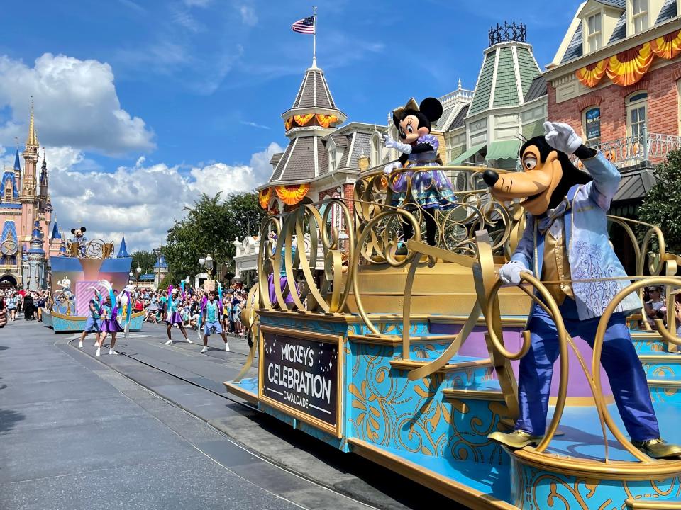 character cavalcade at disney world during 50th anniversary