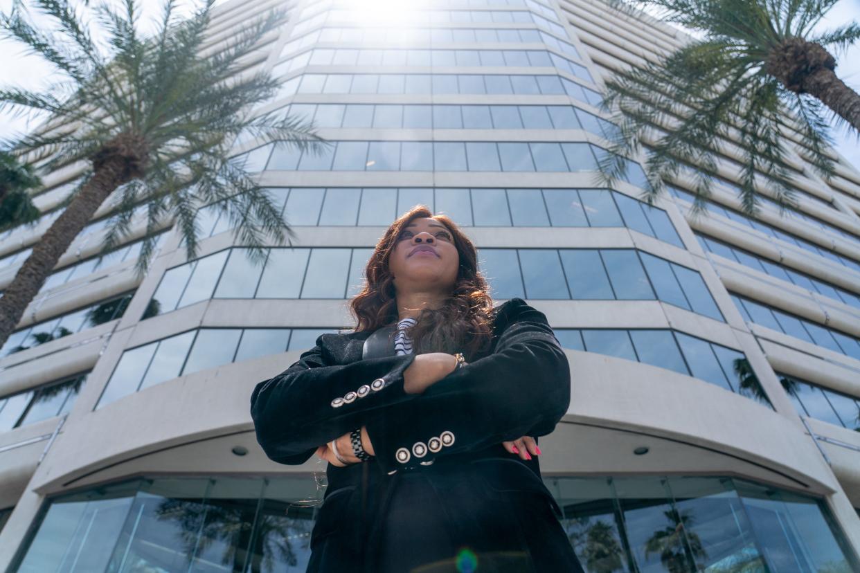 Lelia Adams, immigration attorney at Essien Law Firm, poses for a portrait outside her office in midtown Phoenix on June 8, 2023.