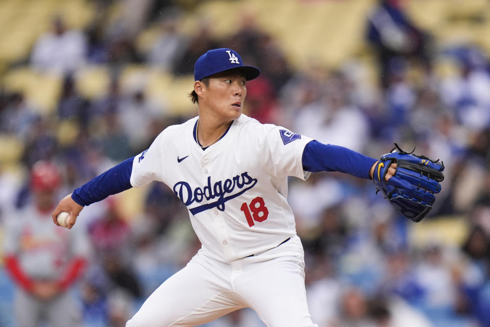 Los Angeles Dodgers starting pitcher Yoshinobu Yamamoto throws to a St. Louis Cardinals batter during the first inning of a baseball game Saturday, March 30, 2024, in Los Angeles. (AP Photo/Jae C. Hong)