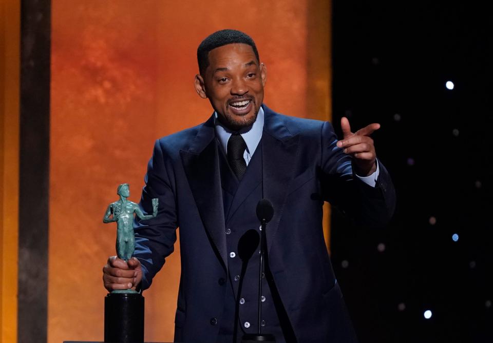 Will Smith accepts the award for outstanding performance by a male actor in a leading role for &quot;King Richard.&quot;