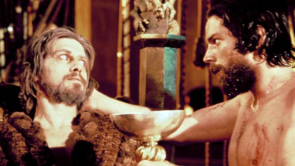 EXCALIBUR, Nigel Terry (left) as King Arthur, Paul Geoffrey (right) as Perceval, holding the Holy Grail, 1981, (c) Orion/courtesy Everett Collection