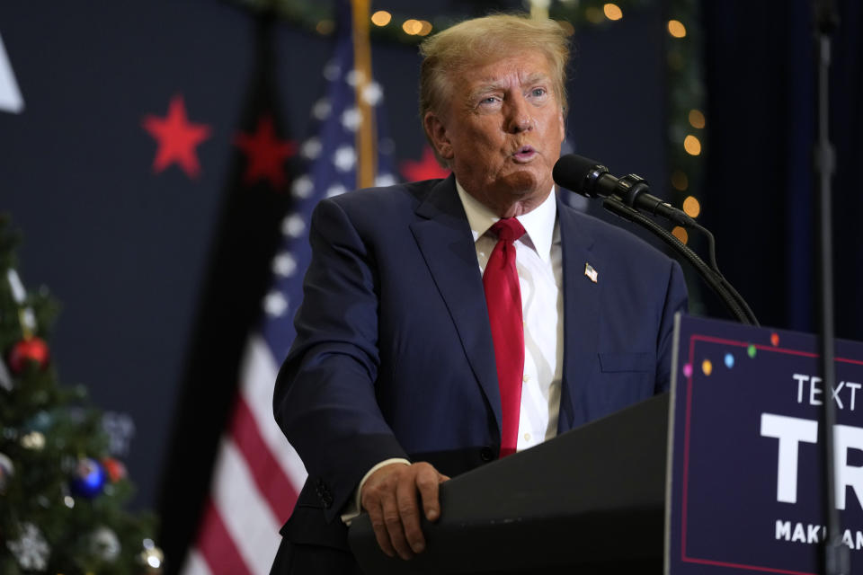 FILE - Former President Donald Trump speaks during a commit to caucus rally, Tuesday, Dec. 19, 2023, in Waterloo, Iowa. Trump pressured two election officials not to certify 2020 vote totals in a key Michigan county, according to a recording of a post-election phone call disclosed in a new report by The Detroit News. The former president’s 2024 campaign has not confirmed or denied the recording’s legitimacy. (AP Photo/Charlie Neibergall, File)