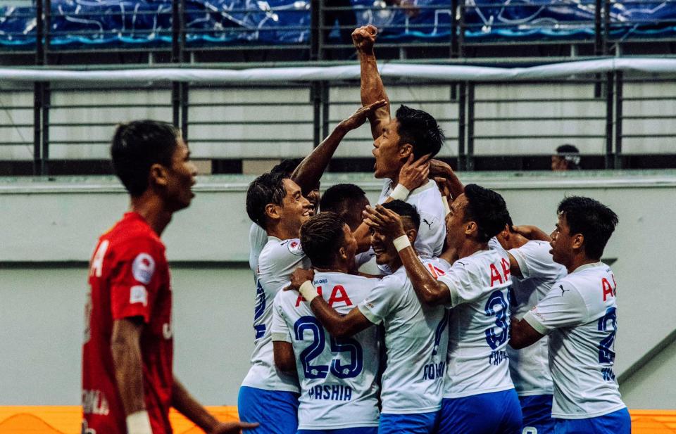 The Lion City Sailors players celebrate Song Ui-yong's opening goal in their 4-1 win over Balestier Khalsa that gave them their first Singapore Premier League title. (PHOTO: Singapore Premier League)