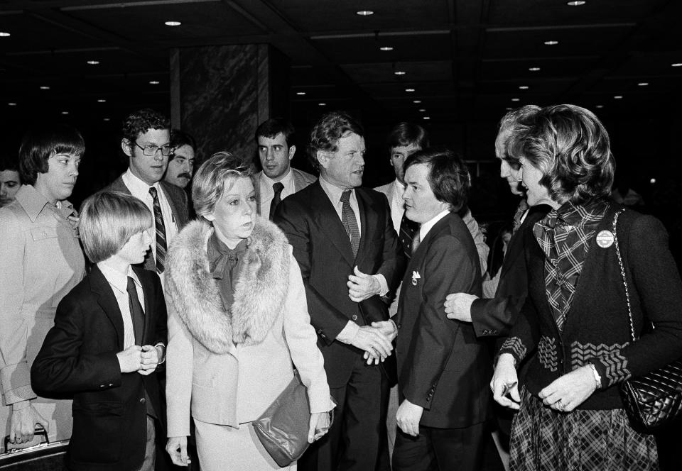 Ted Kennedy, center, shakes hands after leaving breakfast in Chicago in 1979 in Chicago with Mayor Jane Byrne (wearing the fur collar) and his son Patrick, 12. Kennedy began his first full day of campaigning for the Democratic presidential nomination. At right is Kennedy's sister, Pat Lawford.