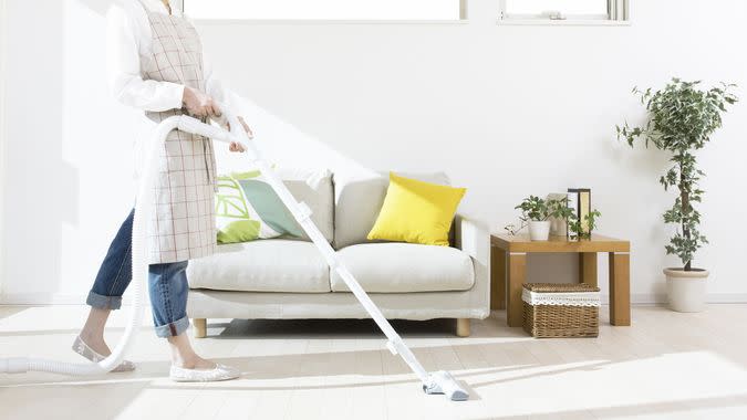 vacuuming the living room