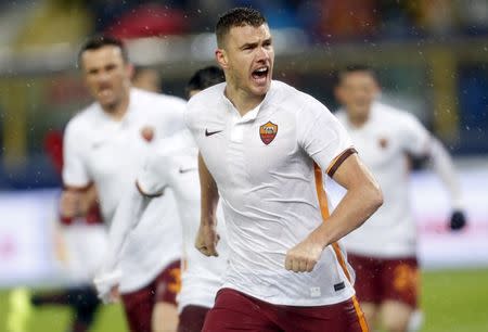 Football Soccer - Bologna v AS Roma - Italian Serie A - Dall'Ara stadium, Bologna, Italy - 21/11/15 Edin Dzeko celebrates after scoring the second goal for AS Roma REUTERS/Giampiero Sposito