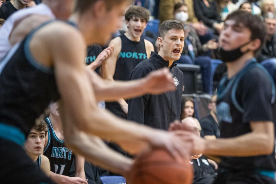 North Oldham head coach David Levitch, II, center, looks on during the first half against Oldham County. Jan. 21, 2022