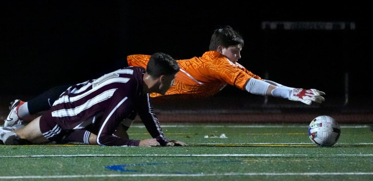 Skippers goalie Ethan Ford dives for a ball in last month's match against La Salle. NK and La Salle will meet again for the Div. I championship on Saturday.