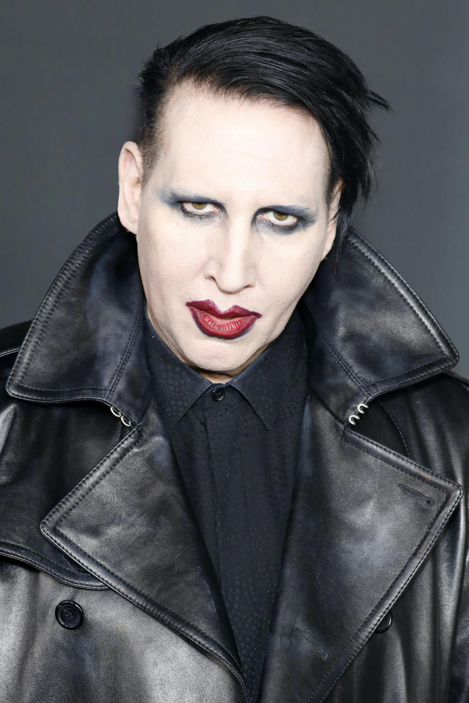 Manson looks into the camera