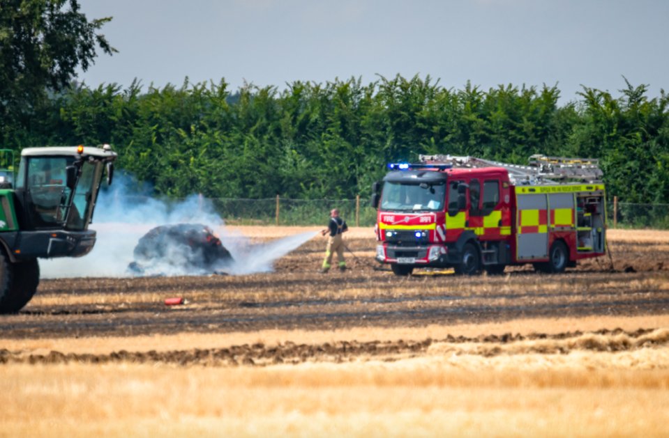 <em>Fire services at RAF Lakenheath attend a fire in fields in the village of Moulton, Suffolk (SWNS)</em>