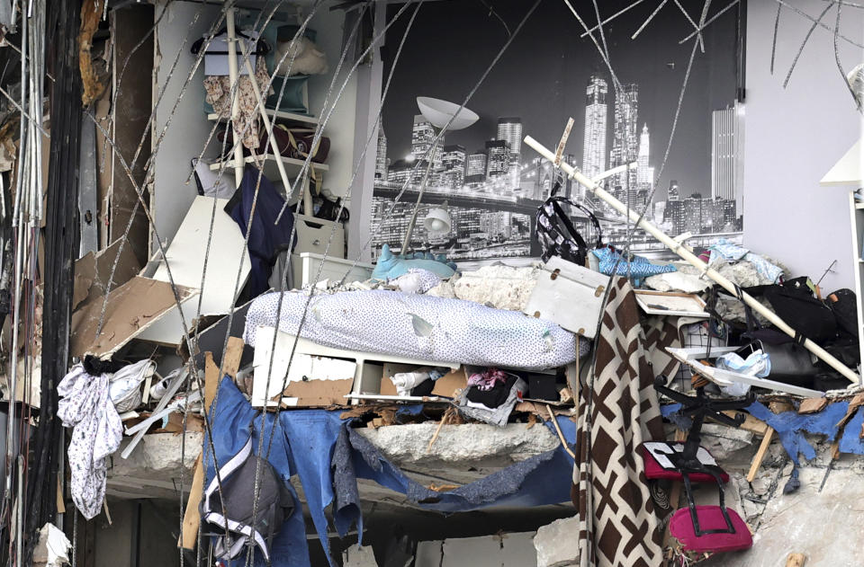 The rubble is seen at the Champlain Towers South Condo in Surfside, Fla., Friday, June 25, 2021. The apartment building partially collapsed on Thursday, June 24. (David Santiago/Miami Herald via AP)