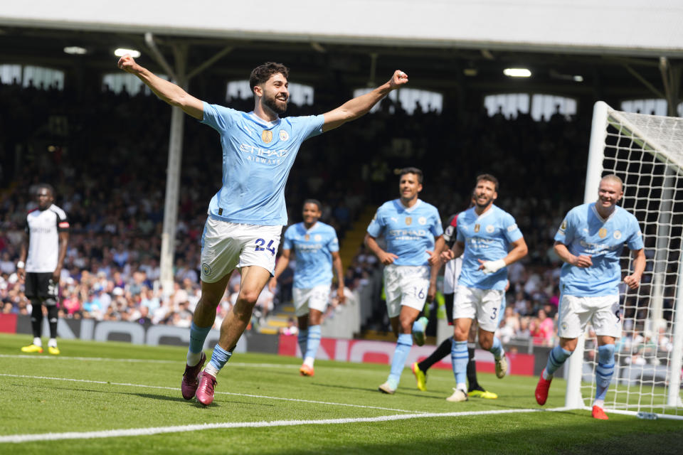 Manchester City's Josko Gvardiol celebrates after scoring his side's third goal during the English Premier League soccer match between Fulham and Manchester City at the Craven Cottage Stadium in London, Saturday, May 11, 2024. (AP Photo/Kirsty Wigglesworth)