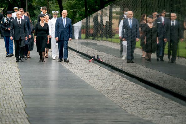 17) Cindy McCain accompanied by President Donald Trump's Chief of Staff John Kelly, right, Defense Secretary Jim Mattis, and family members, arrive at the Vietnam Veterans Memorial.