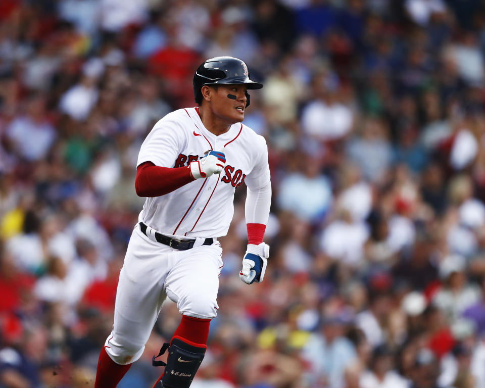 BOSTON, MASSACHUSETTS - SEPTEMBER 18: Yu Chang #12 of the Boston Red Sox hits an RBI double in the bottom of the sixth inning of the game against the Kansas City Royals at Fenway Park on September 18, 2022 in Boston, Massachusetts. (Photo by Omar Rawlings/Getty Images)