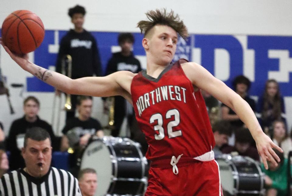 Northwest's Ian Ziegler keeps the ball from going out of bounds at CVCA during the 2023-24 season.