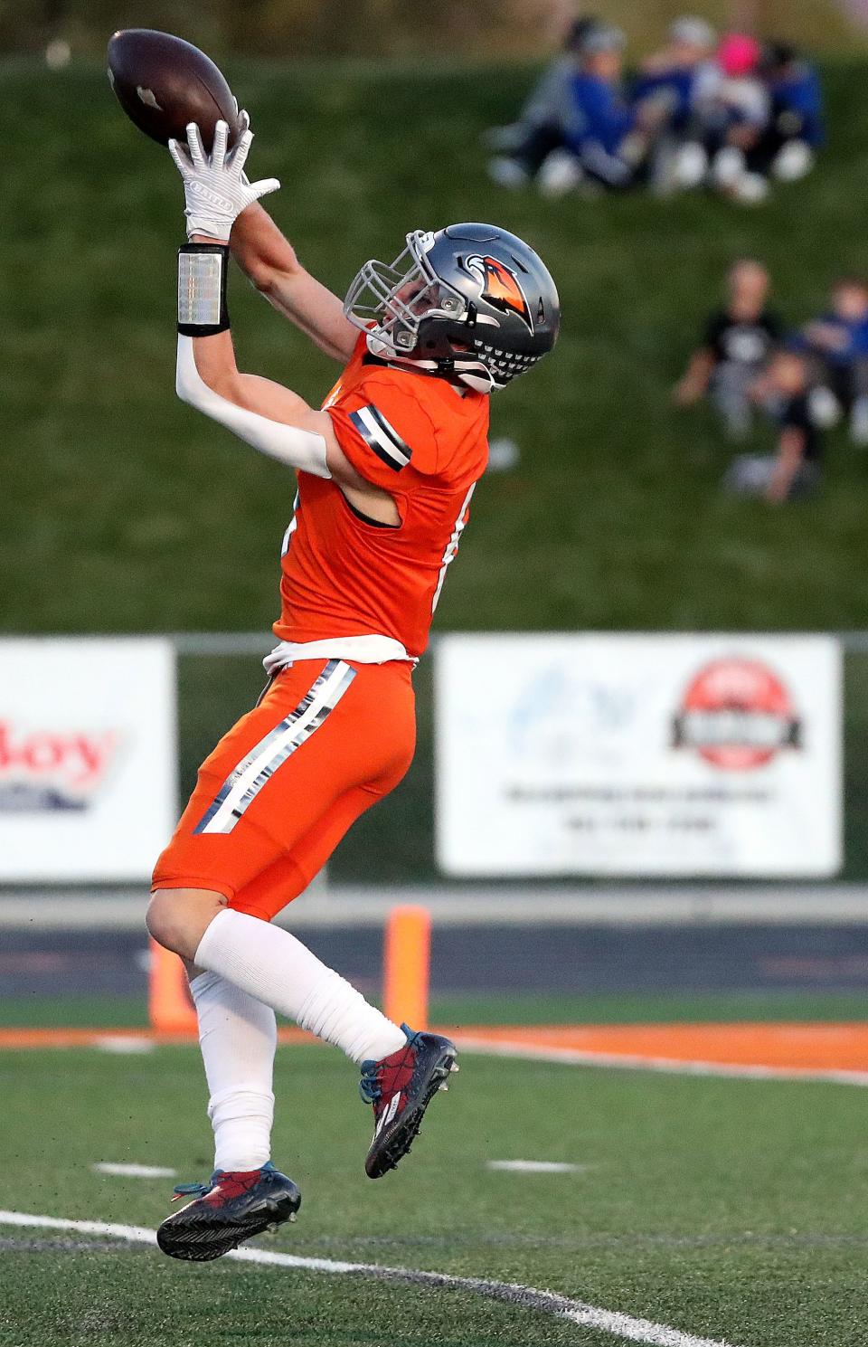 Skyridge’s Trevan Mcclellan completes a pass and scores a touchdown in a 6A quarterfinal football game against Pleasant Grove at Skyridge High School in Lehi on Friday, Nov. 3, 2023. Skyridge won 37-30 in overtime. | Kristin Murphy, Deseret News