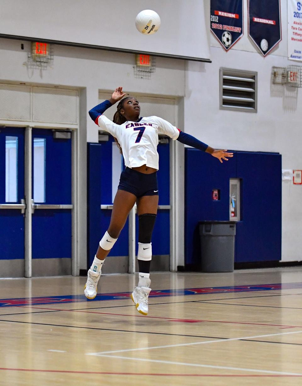 St. Lucie West Centennial's Shayla Henry (7) serves in a volleyball match against Martin County on Tuesday, Aug. 22, 2023, in Port St. Lucie. Centennial won in five sets.