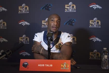 Denver Broncos cornerback Aqib Talib (21) addresses the media during a press conference prior to Super Bowl 50 at Santa Clara Marriott. Kyle Terada-USA TODAY Sports