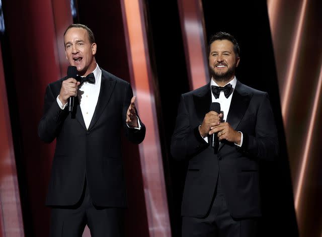 <p>Terry Wyatt/WireImage</p> Peyton Manning and Luke Bryan